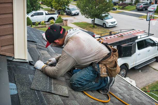 Professional Roofing technician working in Weymouth, MA